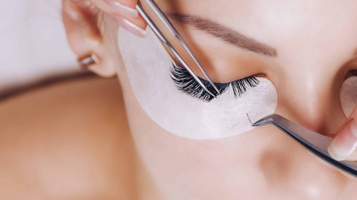 Eyelash Extension Procedure. Woman Eye with Long Eyelashes. Lashes. Close up, macro, selective focus